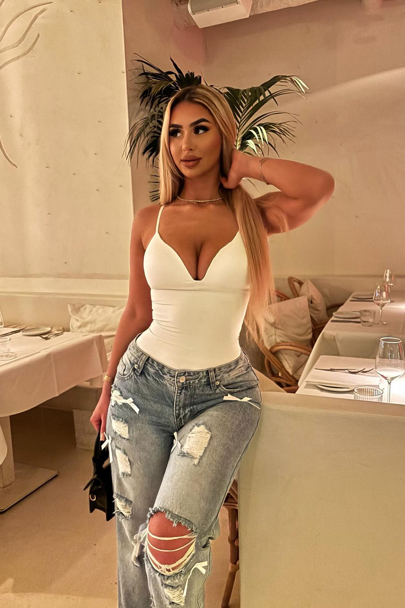 https://cdn.shopify.com/s/files/1/0293/9277/files/3-24-25__404_Serenity_Sculpted_Seamless_Bodysuit_White_JR.jpg?v=1747187677